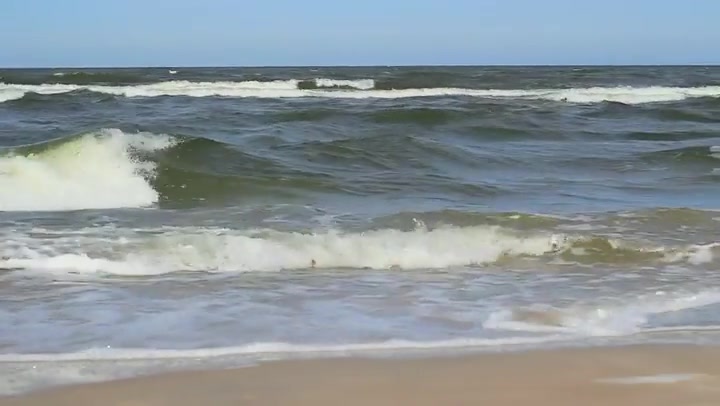 Sea Waves And Sand Castle