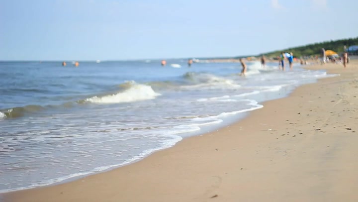 Unfocused Beach With Humans