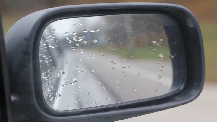 Car Side Mirror In Focus