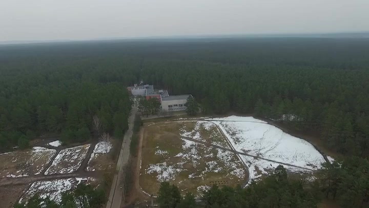 Flight Over Buildings Near Forest 2