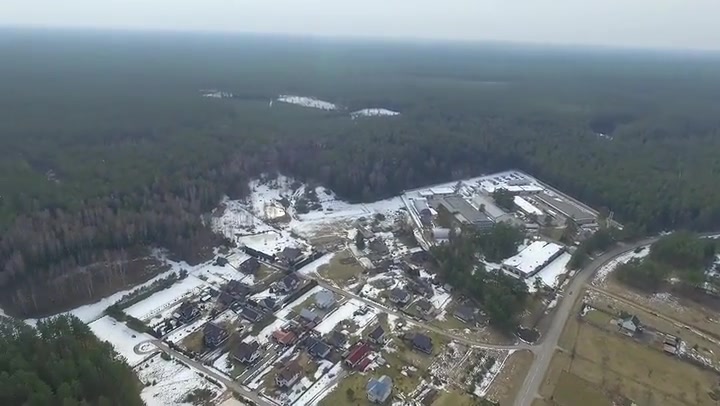 Flight Over Small Town With Left Rotation