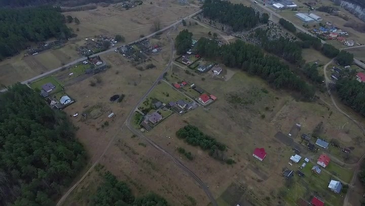 Flight Over The Forest And Small Town In Distance 1