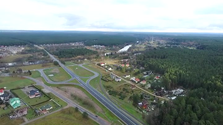 Flight Over The Forest And Small Town In Distance 3