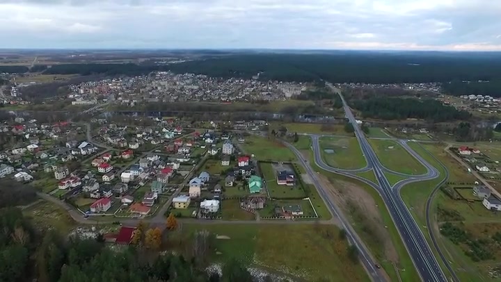 Flight Over The Forest And Small Town In Distance 5