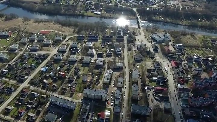 Flight Over Small Town Near River 1