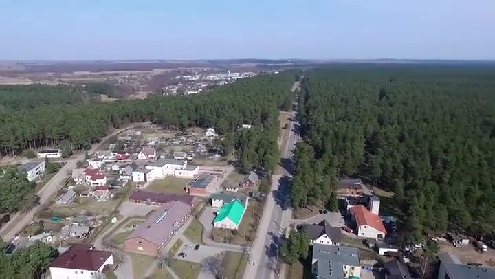 Flight Over Small Town Near Forest 5