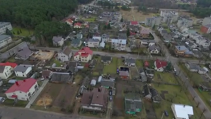 Flight Over Small Town Near Forest 9