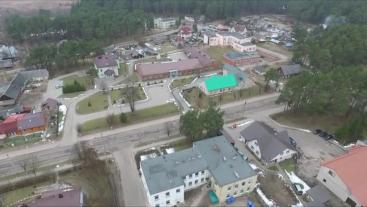 Flight Over Small Town Near Forest 7