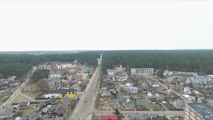 Flight Over Small Town Near Forest 6