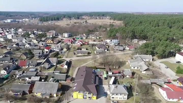 Flight Over Small Town Near Forest 4