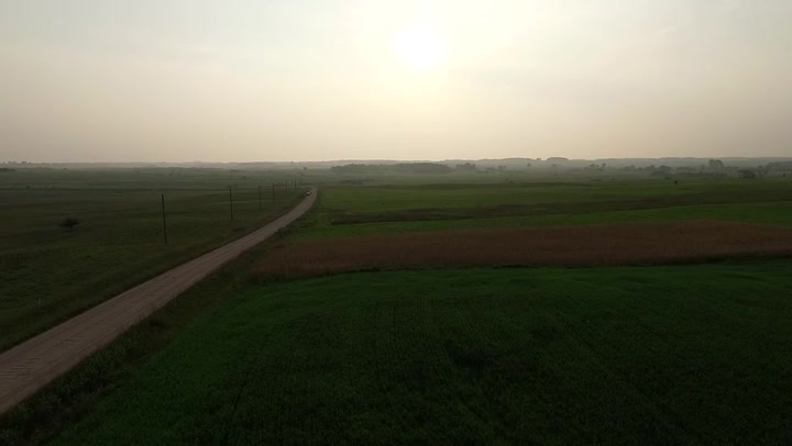 Flight Beyond Gravel Road In Countryside With Rotation