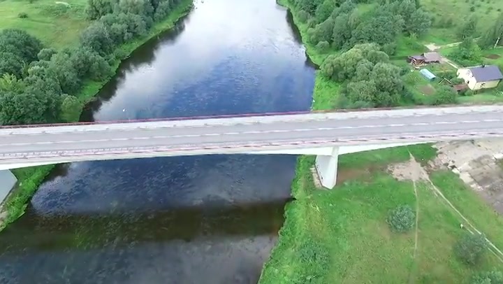 Flying Above River And The Bridge