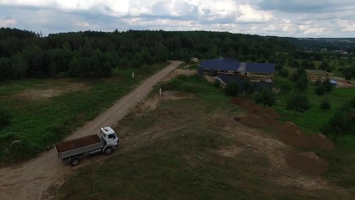 Truck Moving On Gravel Road Near Forest 1