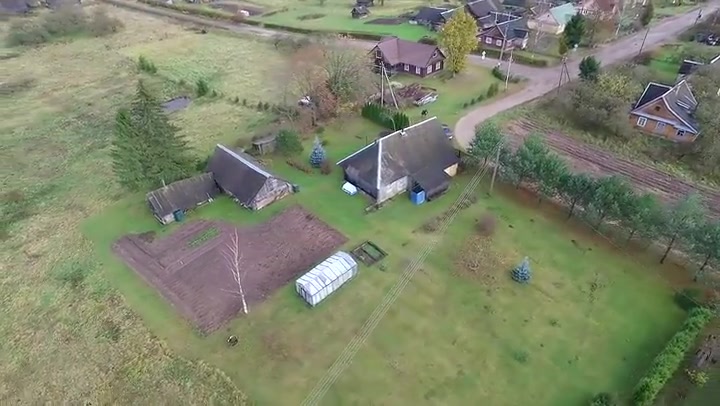 Flight Around Houses In Country