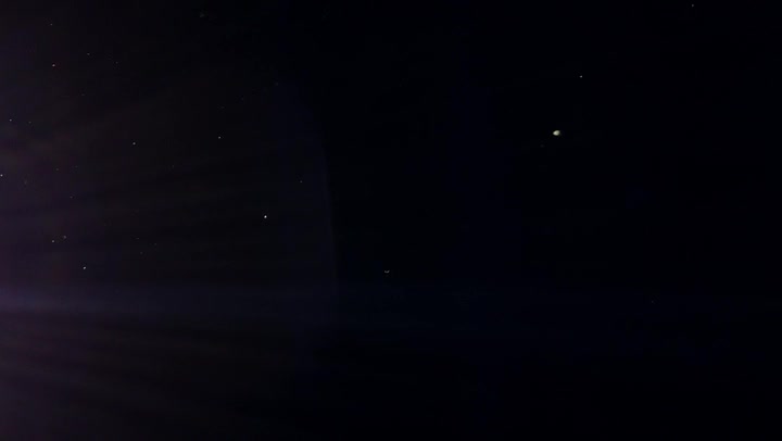Various Pieces Of Dust Flying With Lens Flares